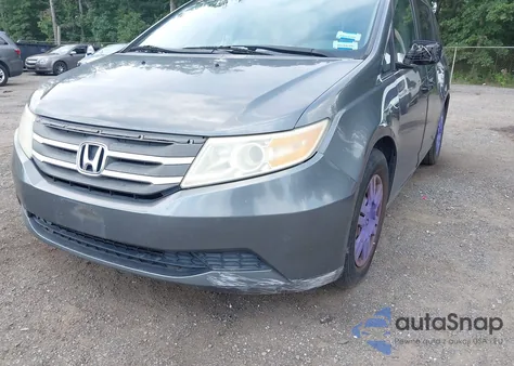 2012 Honda Odyssey Lx z USA, uszkodzony, nr VIN 5FNRL5H26CB056483